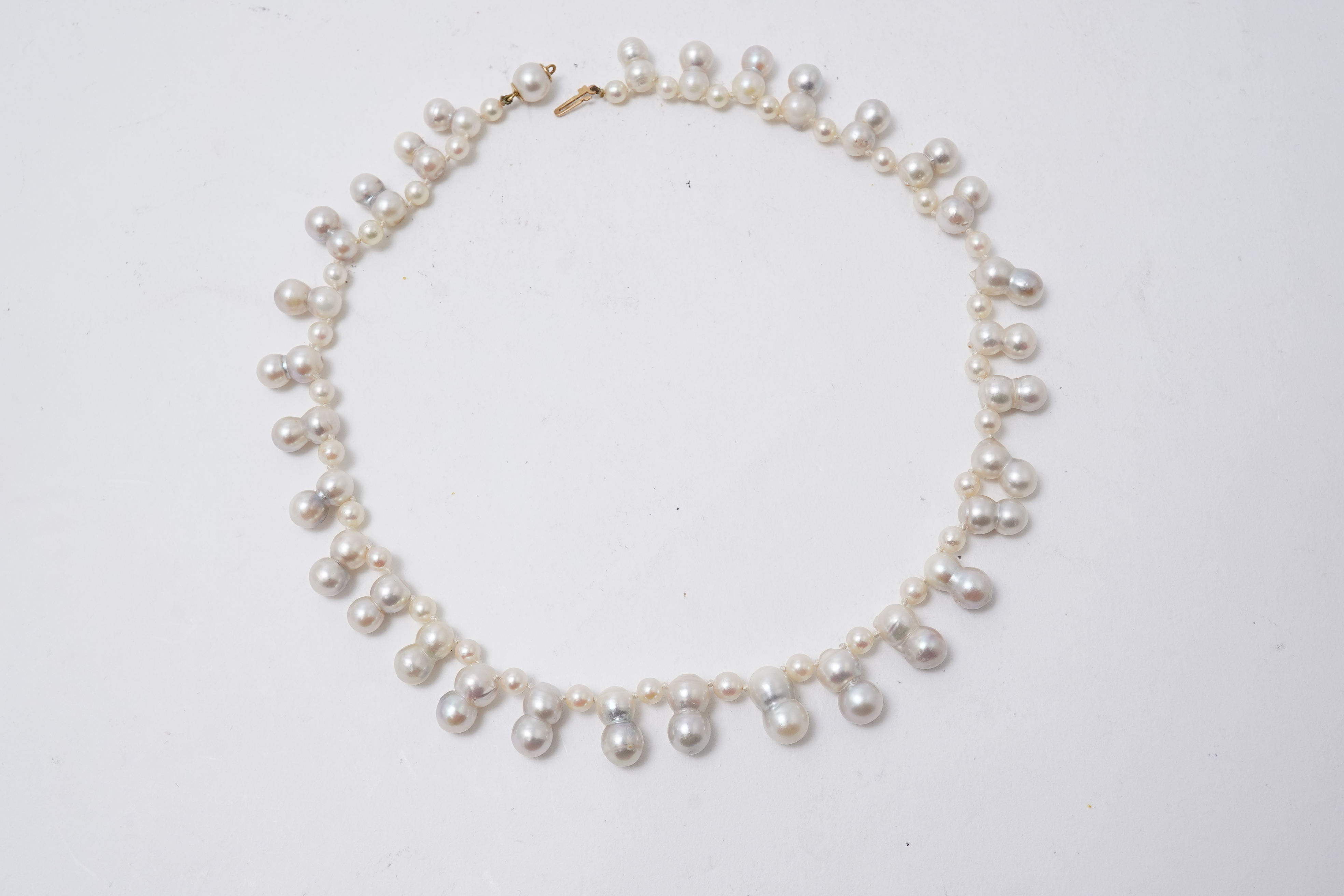 A collection of four cultured pearl necklaces